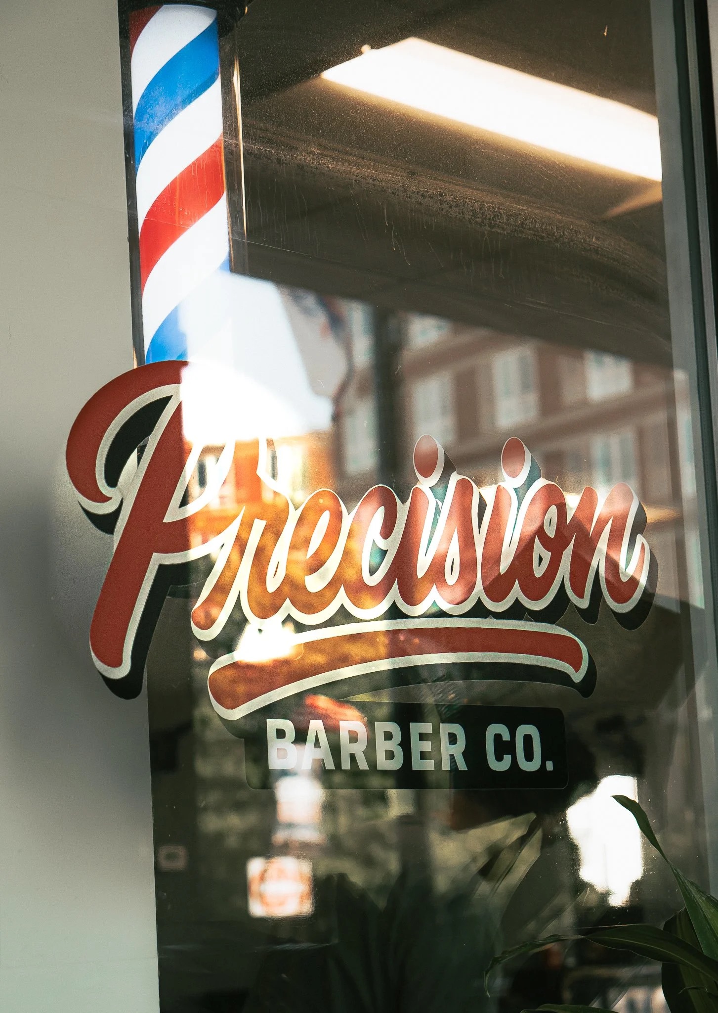 Precision sign in the shop window